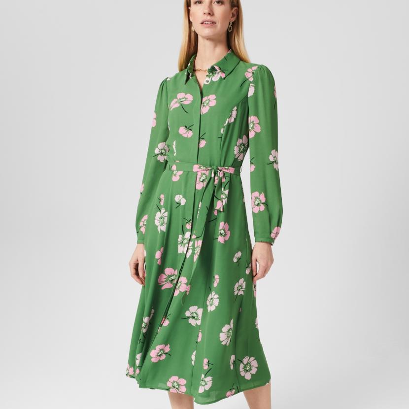 Woman in green floral maxi dress